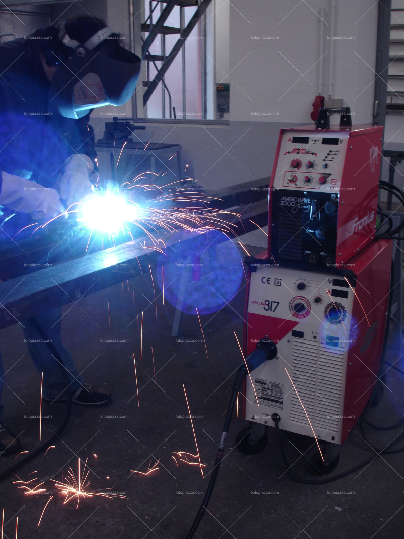 Welding in metal shop